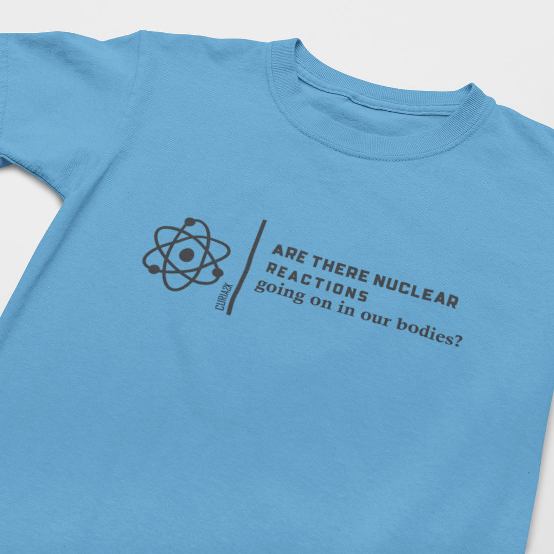 Kid's T-Shirt with question Are there Nuclear Reactions Going On in Our Bodies printed on it. Color is Caroline Blue.