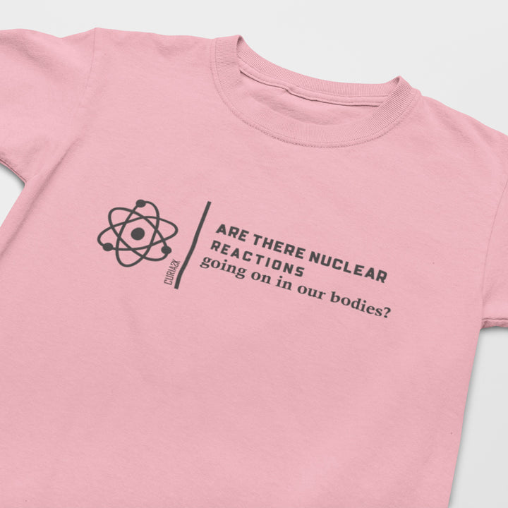 Kid's T-Shirt with question Are there Nuclear Reactions Going On in Our Bodies printed on it. Color is Pink.