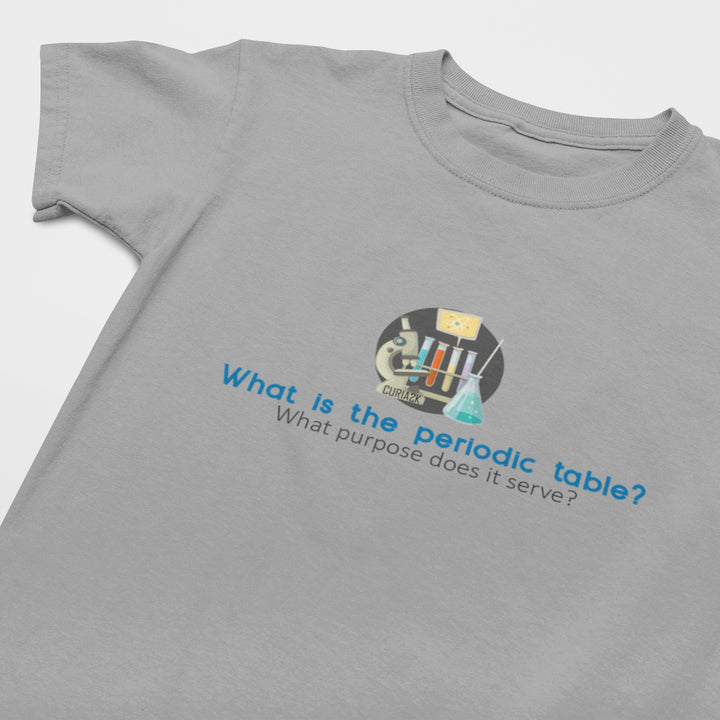 Kid's T-Shirt with question What is the Periodic Table? What purpose does it serve printed on it. Color is Gray.